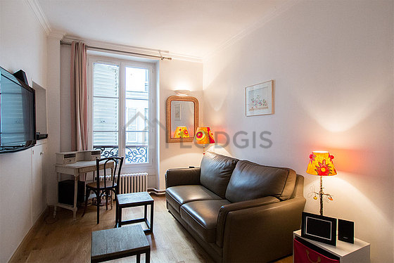 Beautiful office with wooden floor furnished with home cinema, tv, dvd player