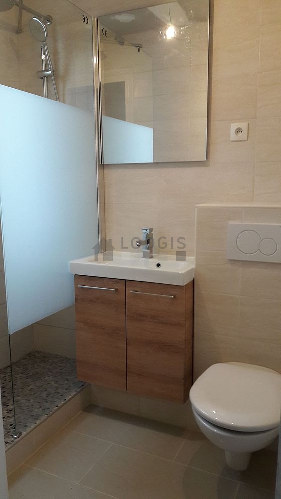 Beautiful and bright bathroom with windows and with tile floor