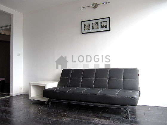Quiet living room furnished with 1 sofabed(s) of 140cm, tv, 4 chair(s)