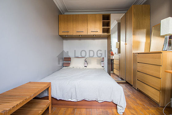 Bedroom with wooden floor