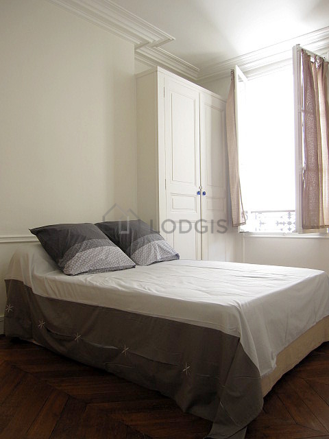Bedroom with double-glazed windows facing the courtyard