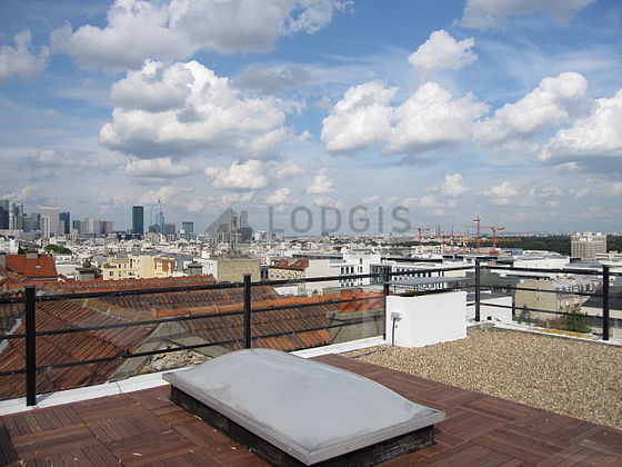 Quiet and very bright balcony with wooden floor