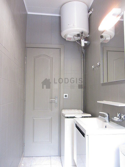 Beautiful bathroom with double-glazed windows and with tile floor