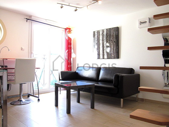 Living room with tile floor
