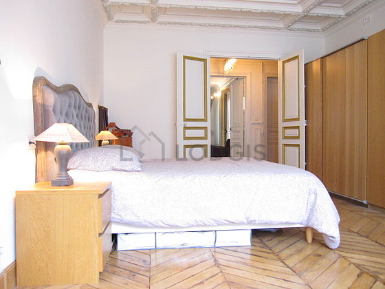 Bedroom with wooden floor
