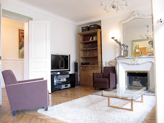 Quiet living room furnished with home cinema, tv