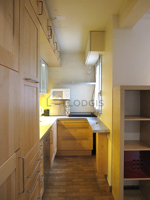 Bright kitchen with windows facing the garden
