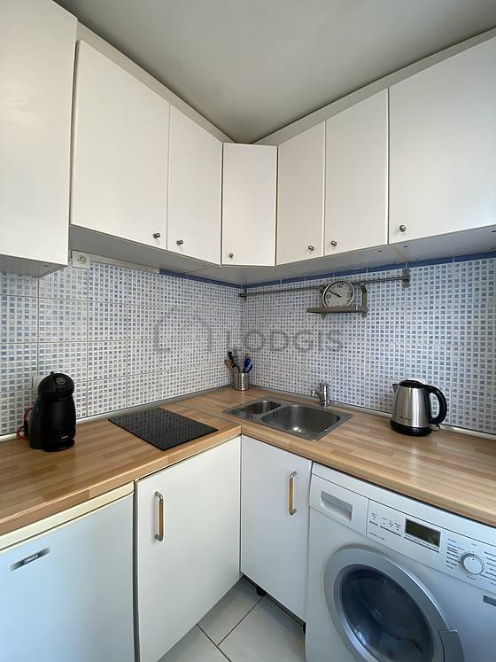 Kitchen with double-glazed windows facing the courtyard