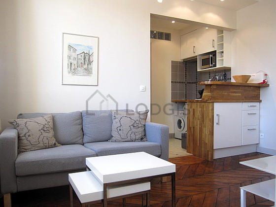 Quiet living room furnished with tv, 1 chair(s)