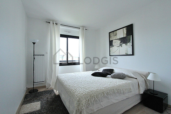 Bedroom with wooden floor