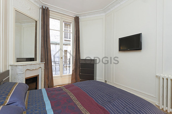 Bedroom with windows facing the courtyard
