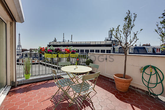 Very bright balcony with floor tiles floor
