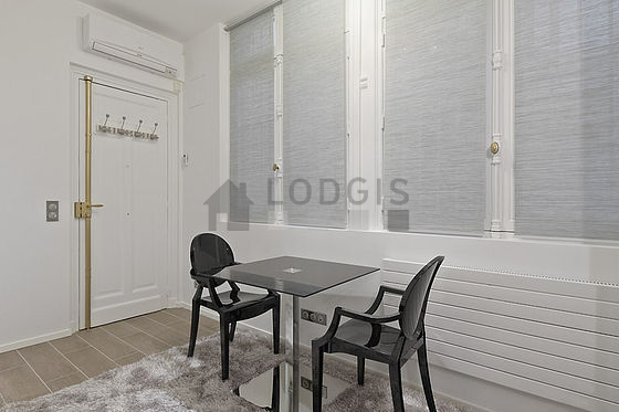 Living room with double-glazed windows facing the courtyard