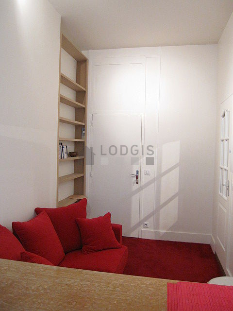 Living room with double-glazed windows facing the road