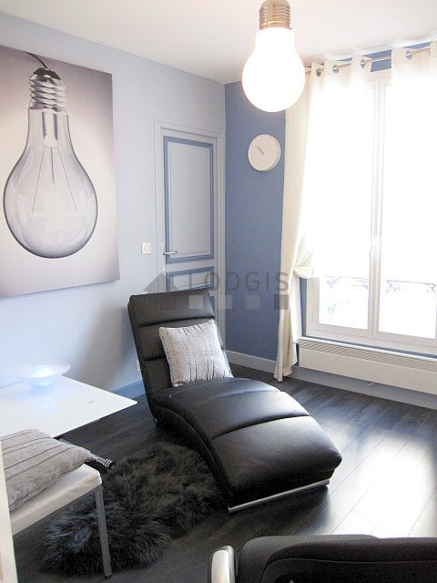 Living room with double-glazed windows facing the courtyard