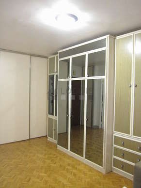 Quiet living room furnished with 1 murphy bed(s) of 140cm, tv, hi-fi stereo, wardrobe