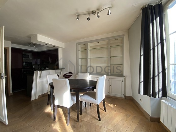 Living room with double-glazed windows facing the road