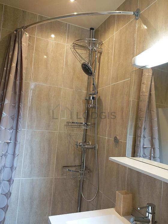 Beautiful bathroom with double-glazed windows and with tile floor