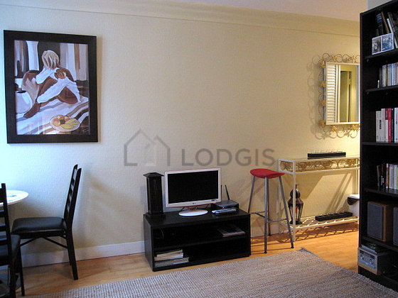 Living room furnished with cupboard, 2 chair(s)