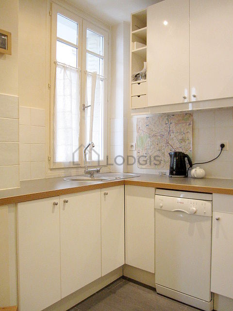 Kitchen equipped with dishwasher, hob, refrigerator, freezer