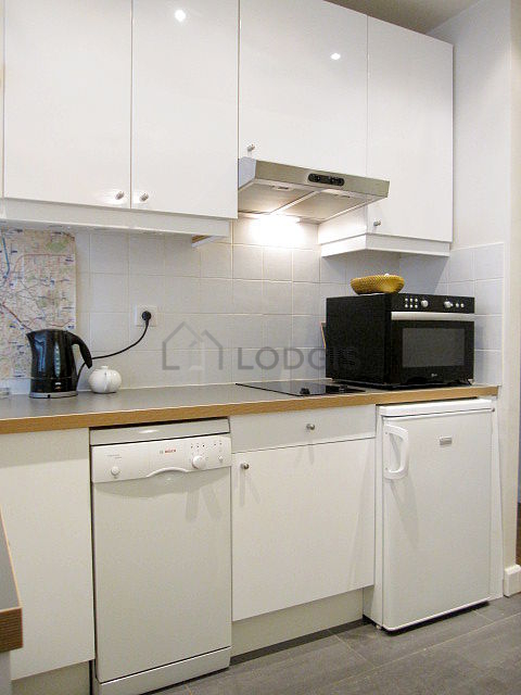 Kitchen with double-glazed windows facing the road