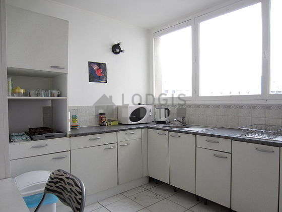 Kitchen where you can have dinner for 4 person(s) equipped with hob, refrigerator, crockery
