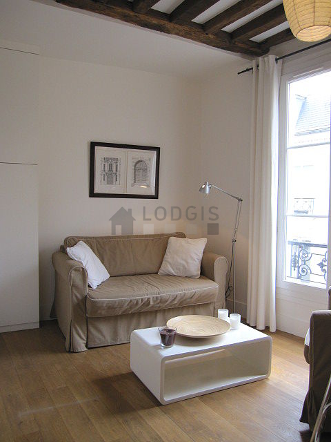 Séjour calme équipé de 1 canapé(s) lit(s) de 120cm, 1 fauteuil(s)