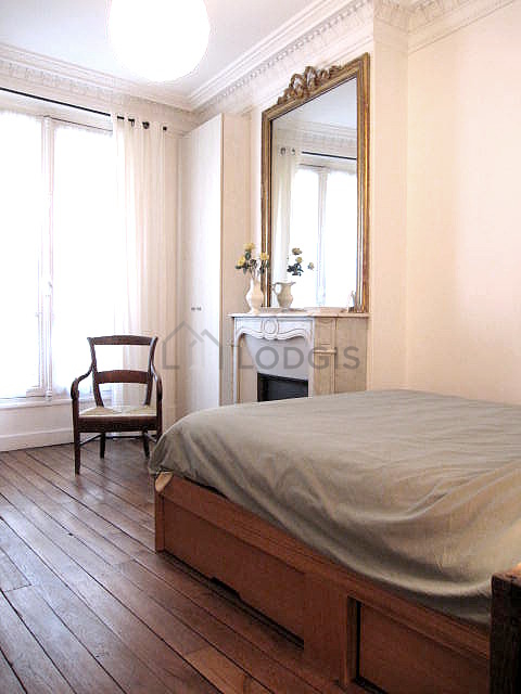 Bedroom with double-glazed windows facing the road
