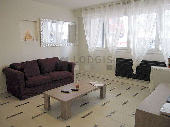 Living room furnished with 1 sofabed(s) of 140cm, tv, cupboard, 5 chair(s)