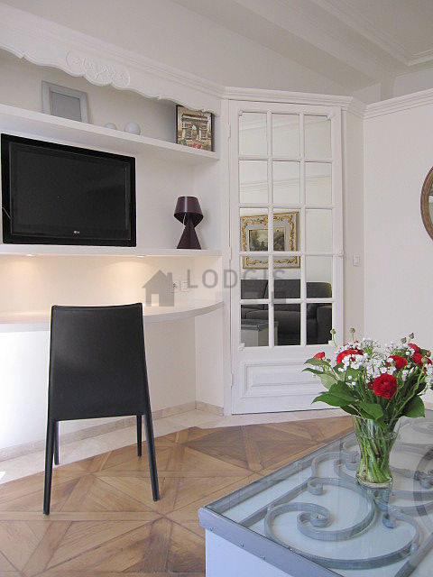Living room with double-glazed windows facing the courtyard