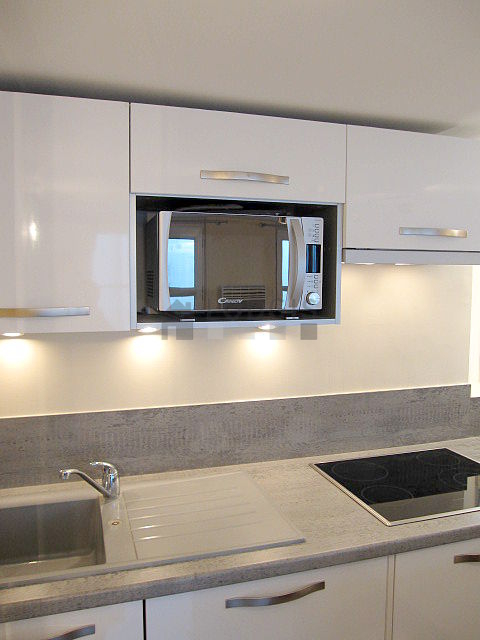 Kitchen equipped with washing machine, dryer, refrigerator, freezer