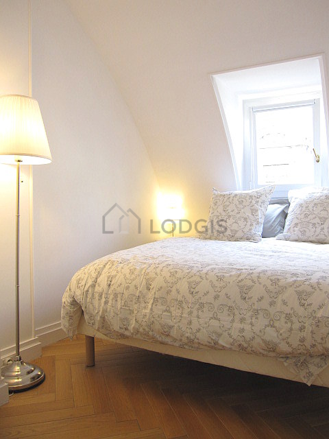 Bedroom with wooden floor