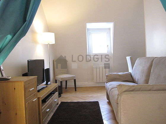Quiet living room furnished with 1 sofabed(s) of 140cm, tv, hi-fi stereo, storage space
