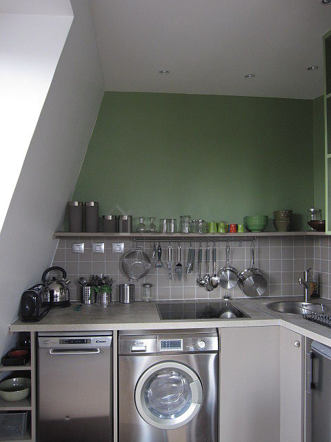 Kitchen equipped with dishwasher, hob, refrigerator, freezer