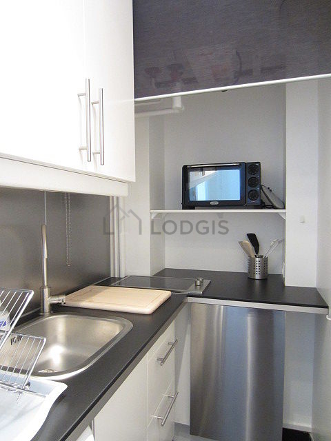 Kitchen equipped with dishwasher, hob, refrigerator, freezer