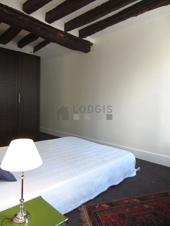 Bedroom with double-glazed windows facing the road