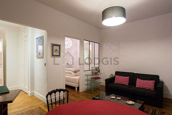 Living room with windows facing the road