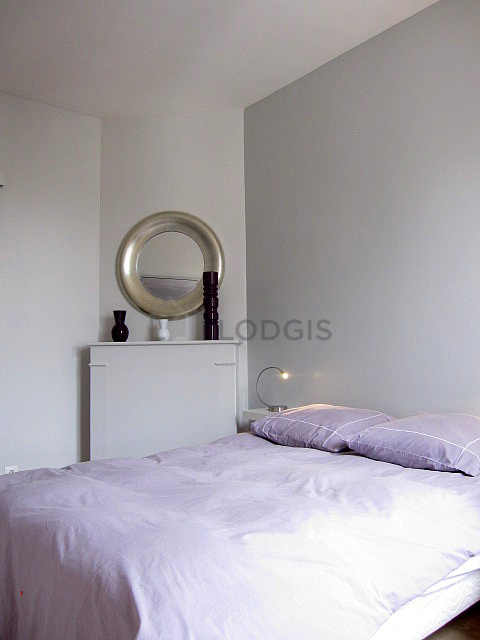 Bedroom with wooden floor
