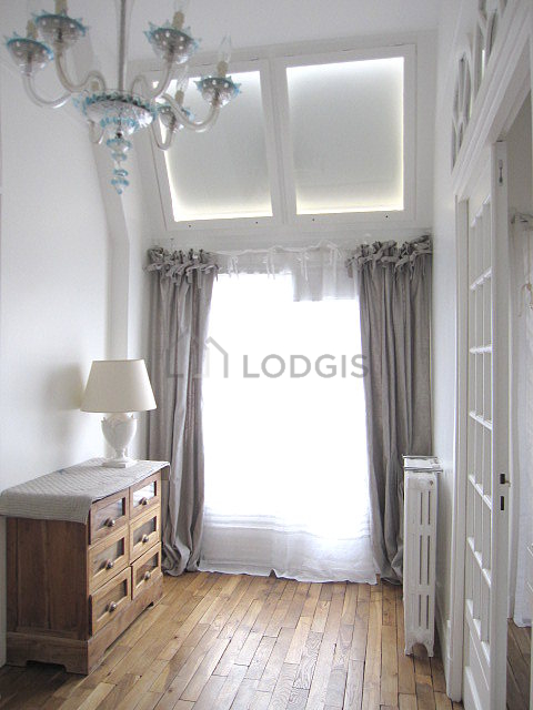Bedroom with wooden floor