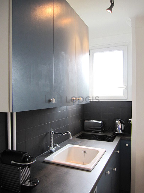 Kitchen equipped with dishwasher, hob, refrigerator, freezer