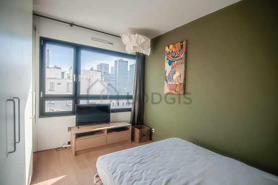 Bedroom with wooden floor