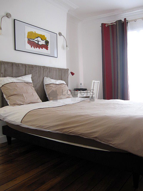 Bedroom with wooden floor