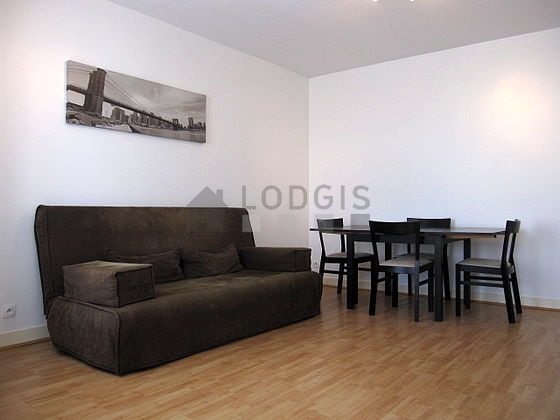Living room with double-glazed windows facing the road