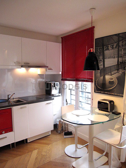 Kitchen where you can have dinner for 2 person(s) equipped with washing machine, dryer, refrigerator, extractor hood