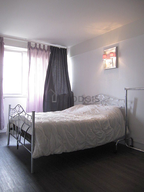 Bedroom with windows facing the garden