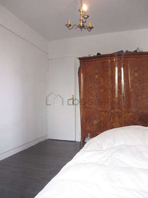Bedroom with wooden floor