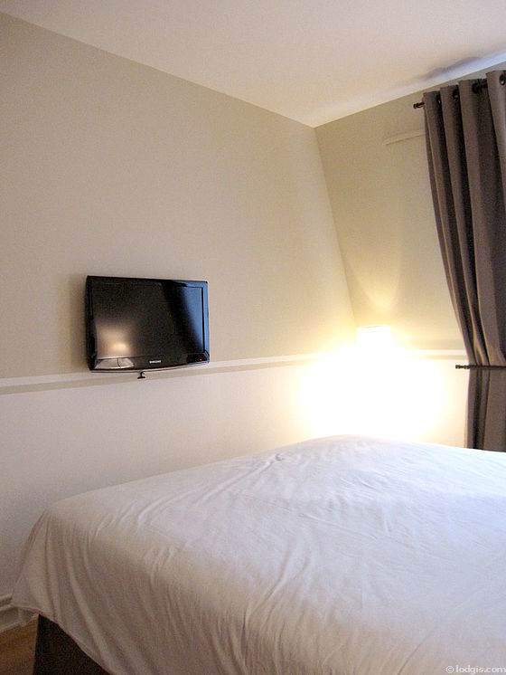 Bedroom with wooden floor