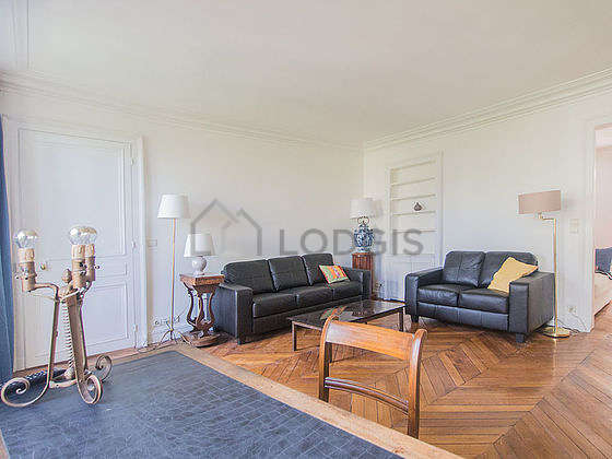Quiet living room furnished with sofa, 3 armchair(s)