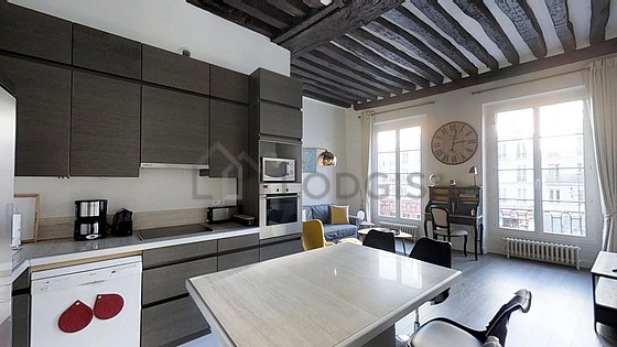 Magnifique cuisineouverte sur le séjour avec du carrelage au sol