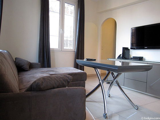 Living room with double-glazed windows facing the road